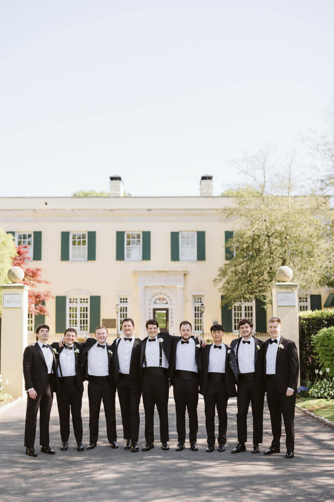 Wedding party portraits at the entrance to the Mansion at Oyster Bay. Photo by OkCrowe Photography.