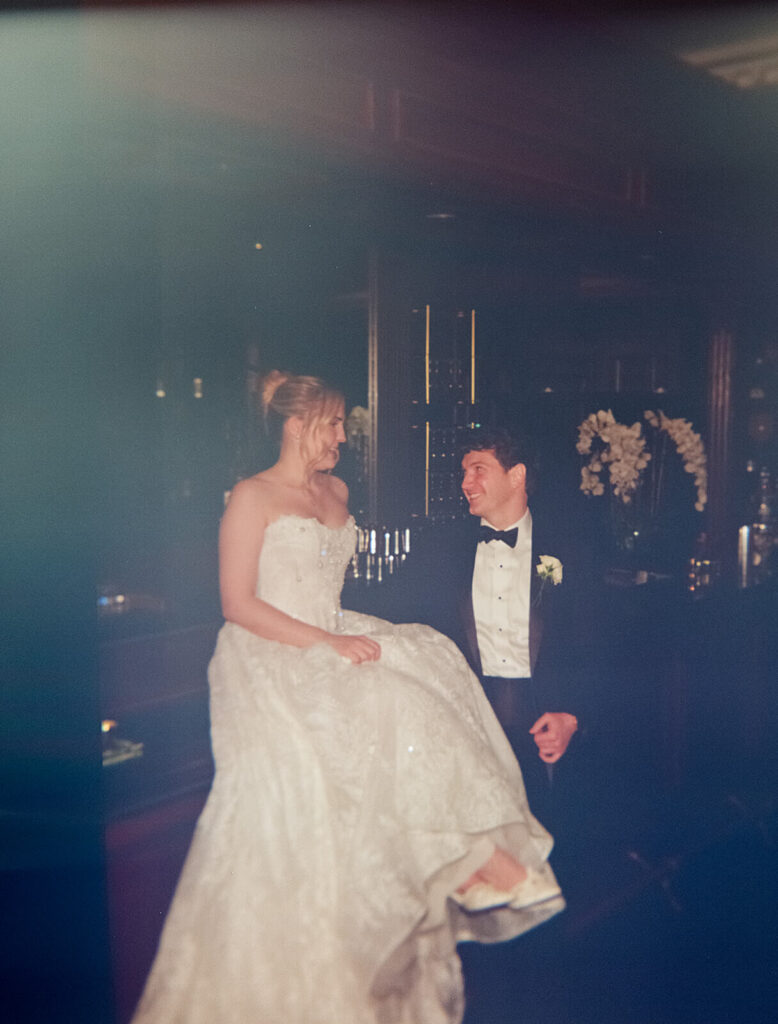 Bride and groom portraits at the Midnight Room, the hidden speakeasy at the Mansion at Oyster Bay. Photo by OkCrowe Photography.