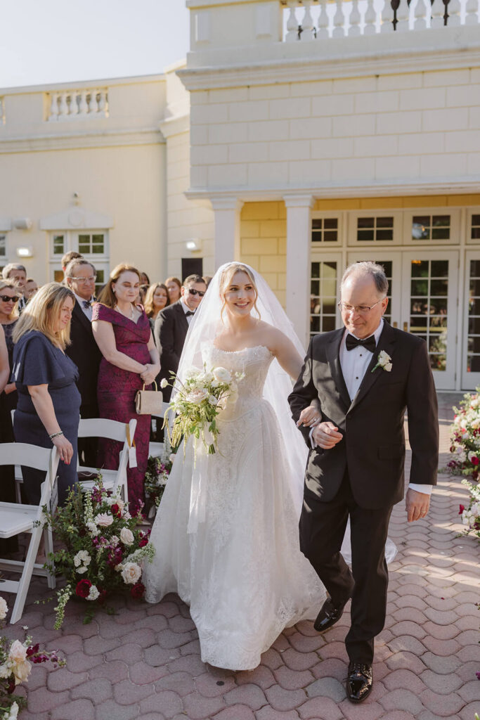 Wedding ceremony at the Mansion at Oyster Bay. Photo by OkCrowe Photography.