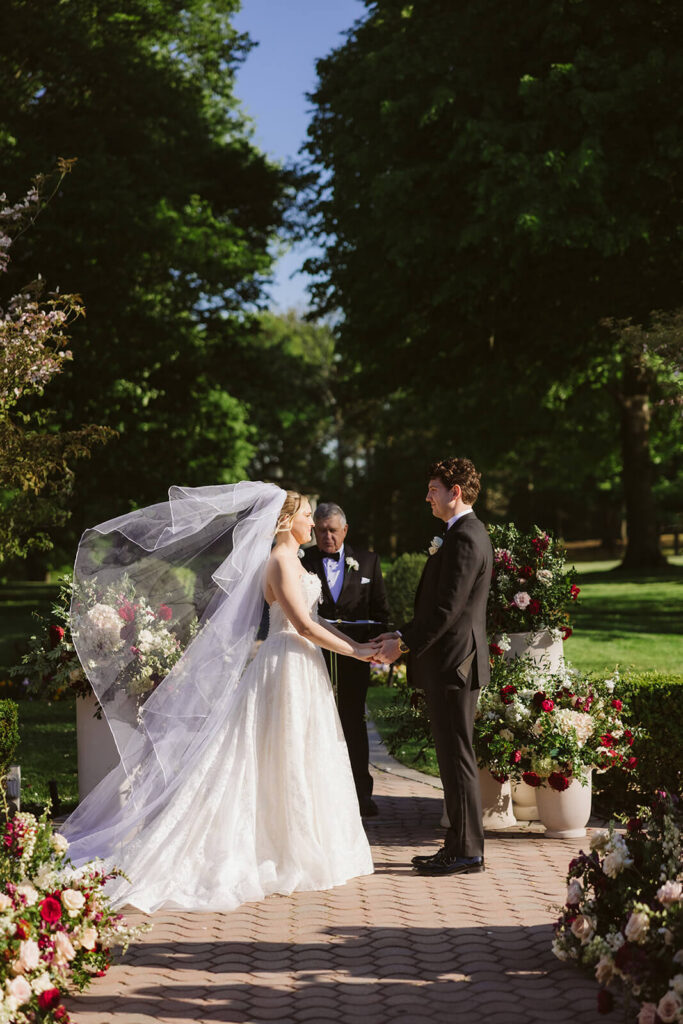 Wedding ceremony at the Mansion at Oyster Bay. Photo by OkCrowe Photography.