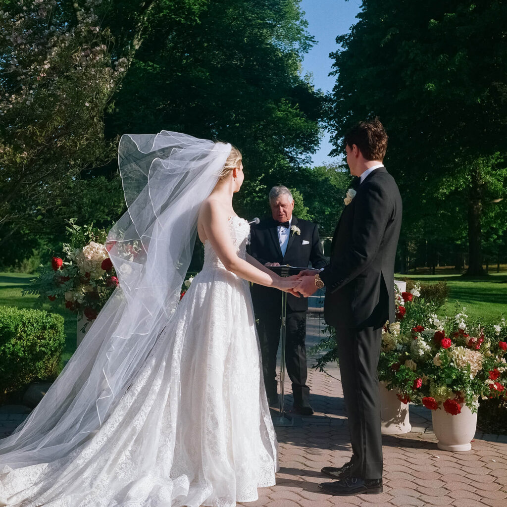 Wedding ceremony at the Mansion at Oyster Bay. Photo by OkCrowe Photography.