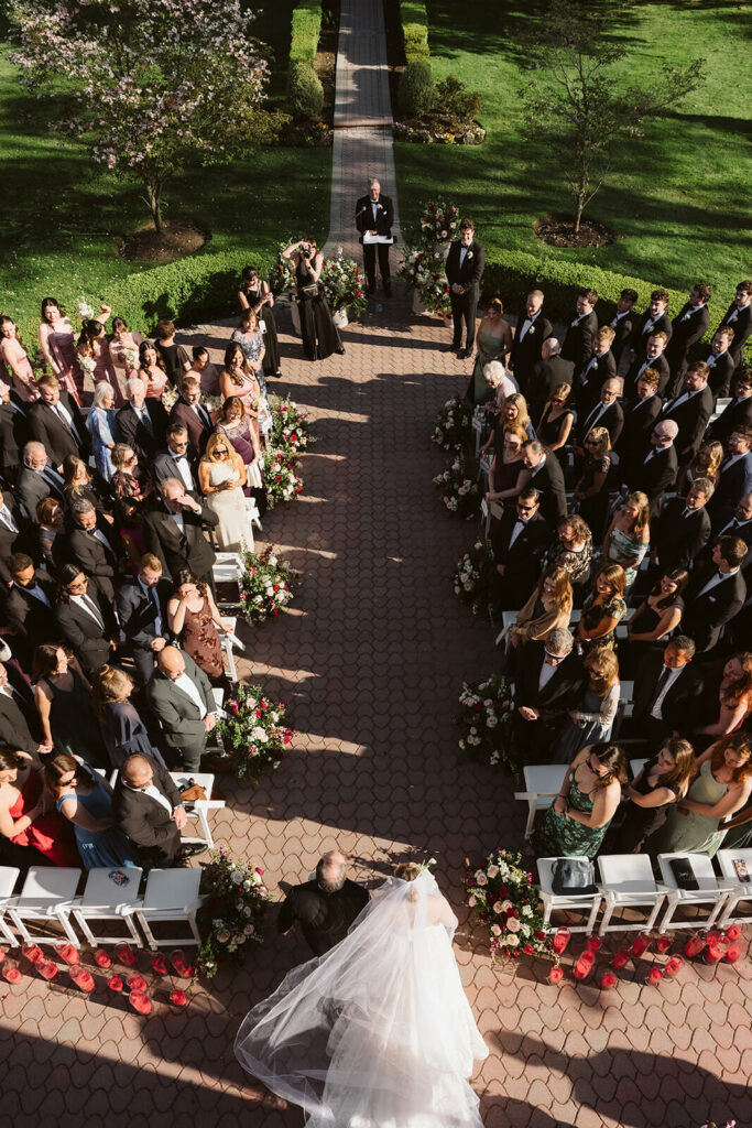 Wedding ceremony at the Mansion at Oyster Bay. Photo by OkCrowe Photography.