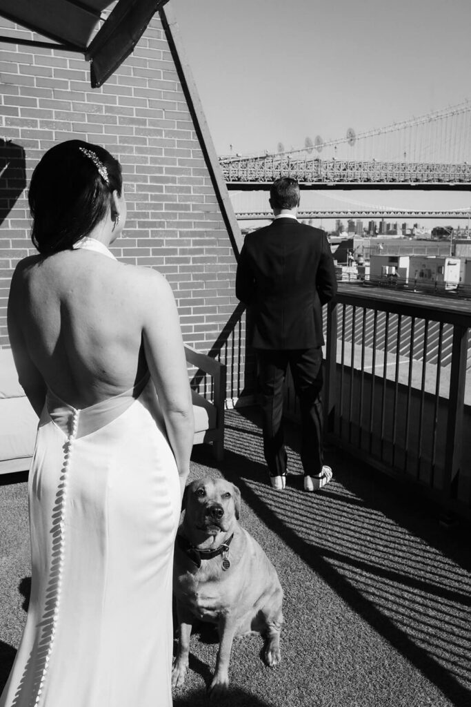 Bride and groom's first look on the balcony of the 33 Seaport Hotel. Photo by OkCrowe Photography.