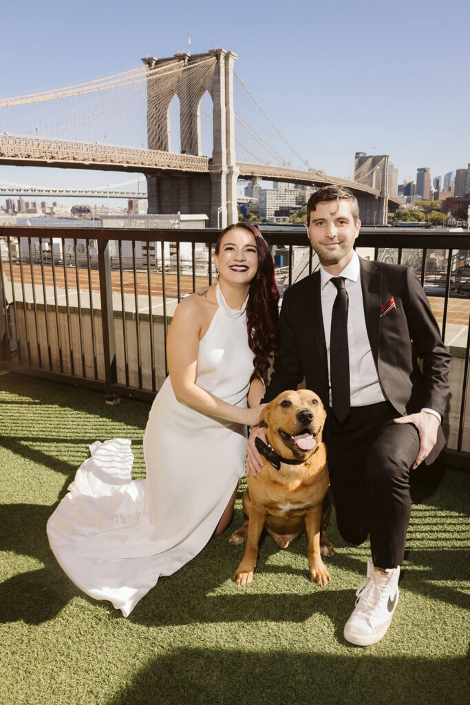 Bride and groom portraits on the balcony of the 33 Seaport Hotel. Photo by OkCrowe Photography.