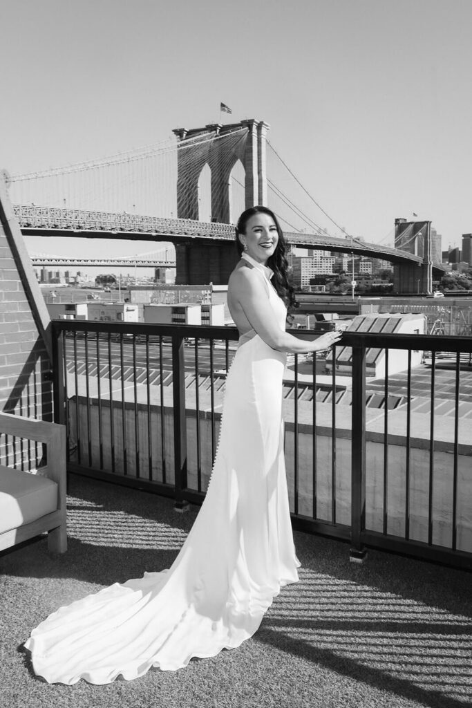 Bride and groom portraits on the balcony of the 33 Seaport Hotel. Photo by OkCrowe Photography.