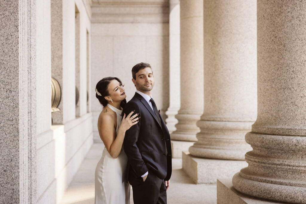Newlywed photos after their elopement ceremony outside the NYC Courthouse. Photo by OkCrowe Photography.