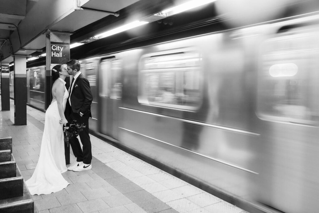 Newlywed photos inside the City Hall Subway Station. Photo by OkCrowe Photography.