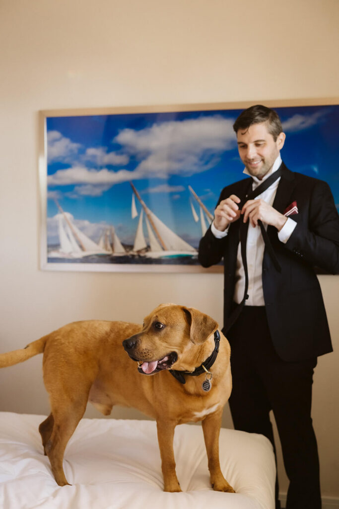 Groom getting ready at the 33 Seaport Hotel. Photo by OkCrowe Photography.