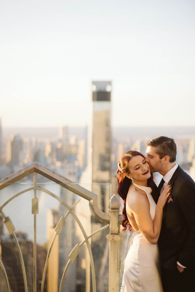 Golden hour rooftop newlywed portraits at Saga restaurant's Solarium. Photo by OkCrowe Photography.
