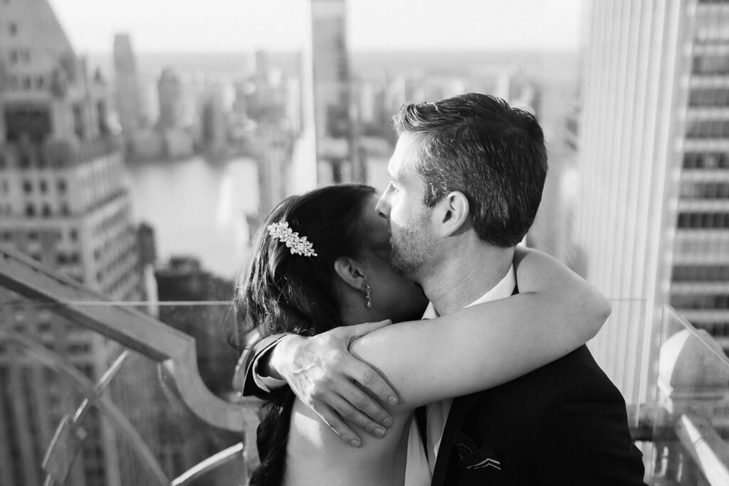 Golden hour rooftop newlywed portraits at Saga restaurant's Solarium. Photo by OkCrowe Photography.