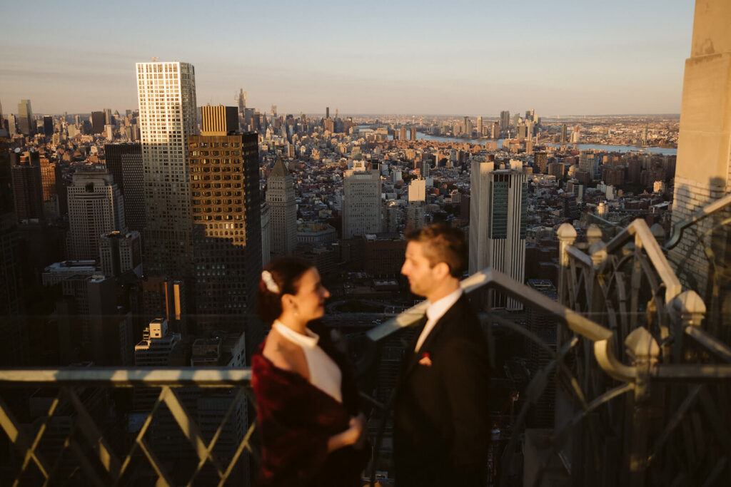 Golden hour rooftop newlywed portraits at Saga restaurant's Solarium. Photo by OkCrowe Photography.