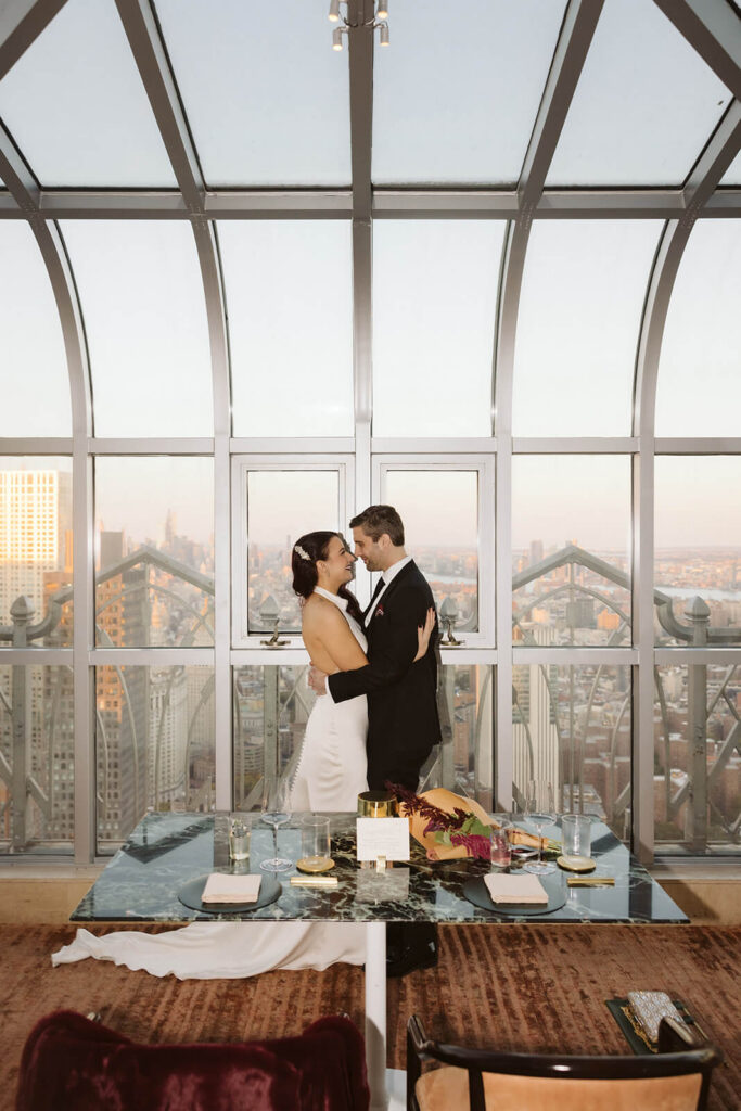 Golden hour rooftop newlywed portraits at Saga restaurant's Solarium. Photo by OkCrowe Photography.