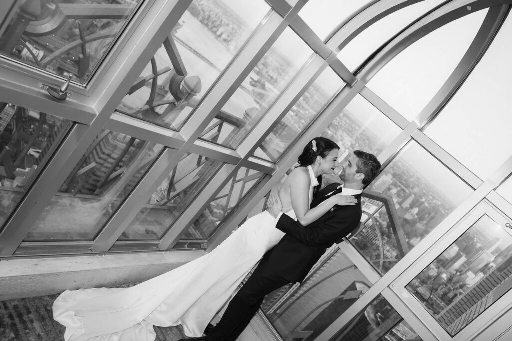 Golden hour newlywed portraits in Saga restaurant's Solarium. Photo by OkCrowe Photography.